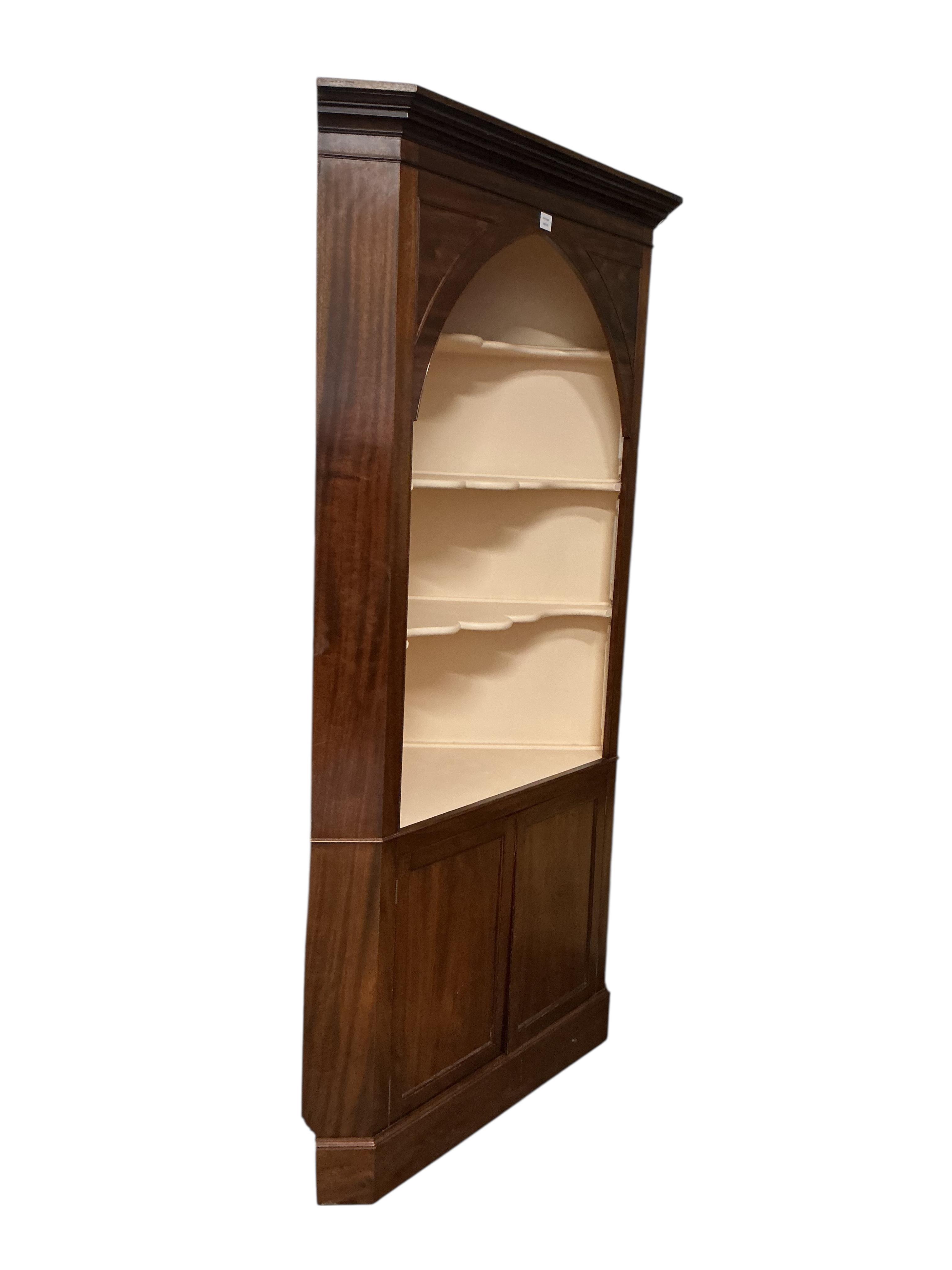 A George III style mahogany standing corner cupboard, width 120cm, depth 60cm, height 223cm